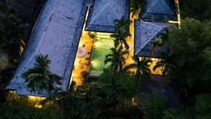 An aerial view of a resort with multiple buildings, a central courtyard with seating, and surrounding palm trees. - Balinese 2 Bedroom Private Pool Villa (Kbr11) (Koh Samui)