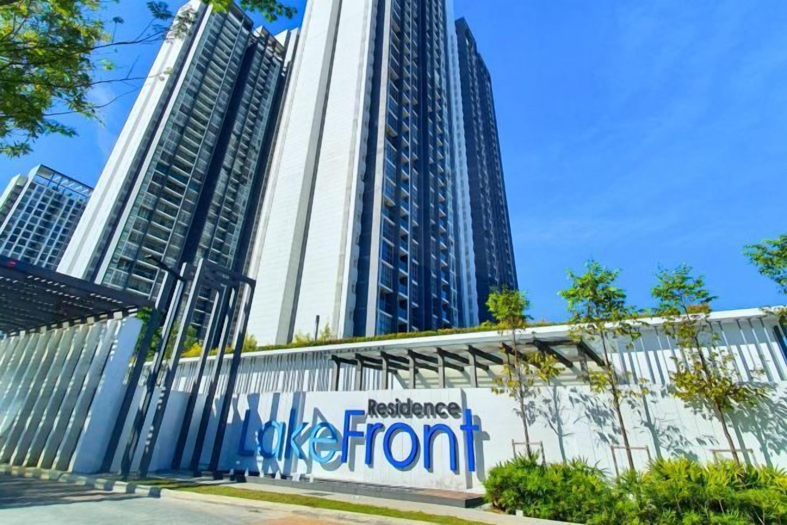 A high-rise building with a sign reading 'Residence LakeFront.'