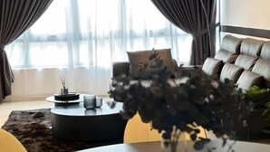 A modern living room with a sofa, a round coffee table, and a vase with flowers. - Botanika, Shadow Night by Antlerzone (Plentong)