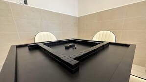 A modern room with a black rectangular table, beige walls, and two white chairs. - Botanika, Shadow Night by Antlerzone (Plentong)