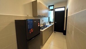 A compact kitchen with a refrigerator, a stove, and a sink. - Botanika, Shadow Night by Antlerzone (Plentong)