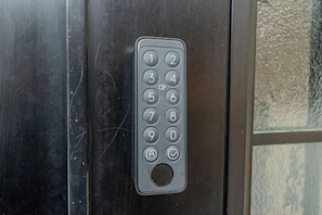 A keypad lock on a metallic door. - 4-min walk/4 lines/95m2+free garage/4BR 2T 2B (Tokyo)