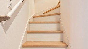 A staircase with wooden steps and a handrail. - Higashi Mukoujima 6 chome (Tokyo)