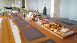 A breakfast buffet with various food items and condiments. - Maya Anda Villa (Phuket)