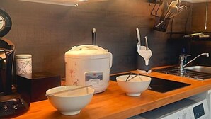 A kitchen with a coffee maker, a rice cooker, and a sink. - New Studio/Near Airport CDG/Direct Paris center/Disneyland/Villepinte EXPO (Tremblay En France)