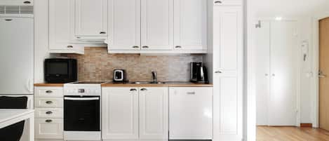 Íbúð - svalir - borgarsýn | Einkaeldhús