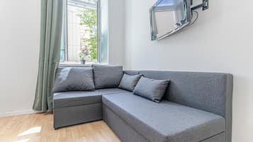 Departamento básico | Tabla de planchar con plancha, wifi gratis y ropa de cama