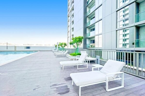 Outdoor pool - bnbme Skyline & Canal View: 1BR near Downtown (Dubai)