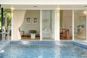 A hotel room with a private balcony, a seating area, and a dining space. - Khaoyai Valley8 (3BR-max 10 guests) (Pak Chong)