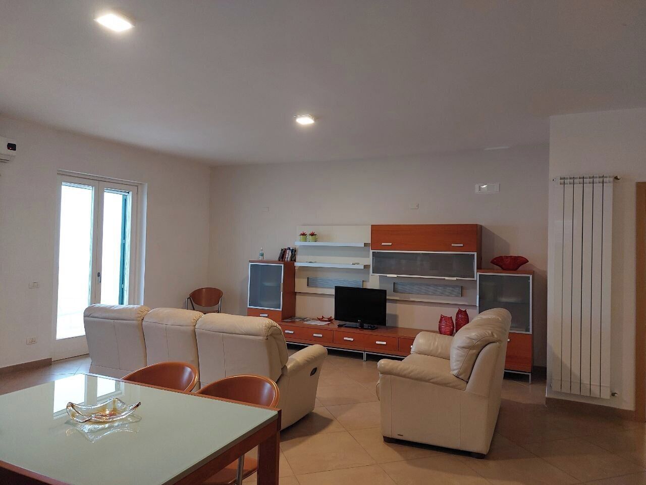 Apartment, Sea View | Living area | TV