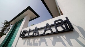 A building entrance with a sign that reads "MILAARI". - 1BR Villa with Private Pool in Amed (Bali)