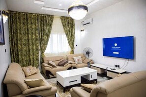 Living area - Bumcy apartment (Abuja)