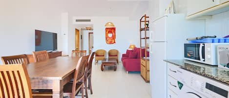 Comfort Apartment, Sea View, Beachfront | Private kitchen | Full-size fridge, microwave, oven, stovetop