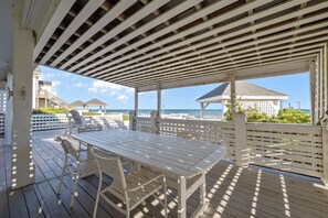Outdoor dining - Stargazer #202 - 5 BR Oceanfront Home in the heart of Surf City, NC (Surf City)