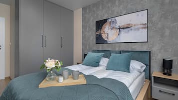 1 bedroom, desk, iron/ironing board, travel crib