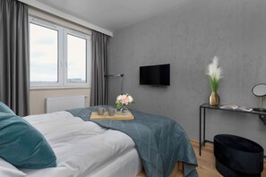 1 bedroom, desk, iron/ironing board, travel crib