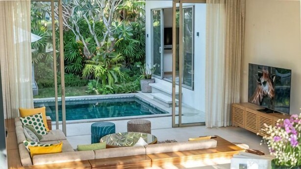 A modern living room with a pool, outdoor seating, and a television. - Villa Allamanda 3 Bdrm Best Location Bangtao Beach VVPHU88 (Phuket)