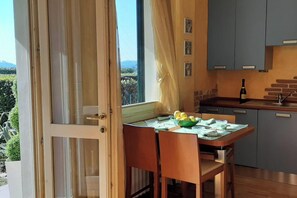 Standard Apartment, Multiple Bedrooms (Holiday House Sole View & Shared Pool) | Dining - Holiday House Sole View & Shared Pool (Salò)