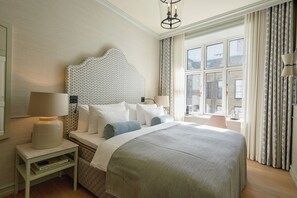 Luxury Room | Literie de qualité, couette en duvet, lit avec matelas à plateau-coussin