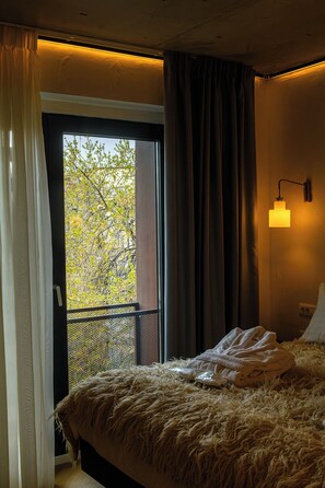 Standard Double Room, City View | Minibar, individually decorated, desk, blackout drapes