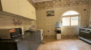 Private kitchen - Chessboard Oasis - Elite 2BR apart by BC residence (New Cairo City)