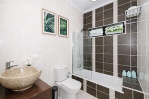 Shower, hair dryer, towels, soap