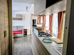 Microondas, parrilla de estufa y lavavajillas 