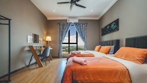 A bedroom with a bed, a desk, a chair, a ceiling fan, and a window with curtains. - The Platino Johor Bahru (Tebrau)