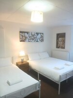 Deluxe Studio Suite, Garden View | Iron/ironing board, free WiFi