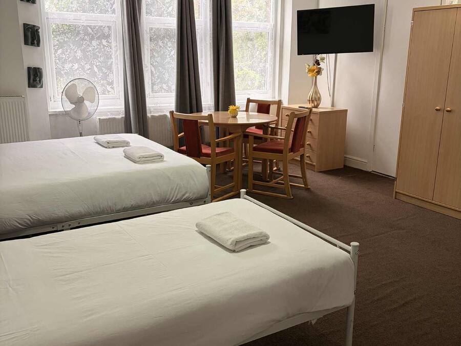 Deluxe Studio Suite, Garden View | Iron/ironing board (on request), free WiFi