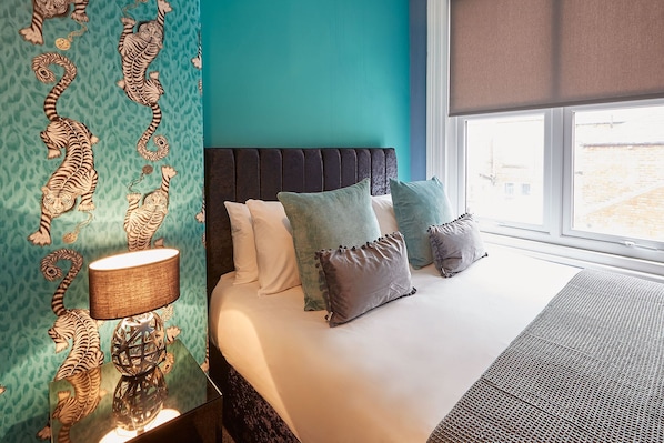 2 habitaciones, tabla de planchar con plancha, wifi y ropa de cama