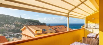 Holiday Home 'Sole E Mare Buggerru - Appartamento' with Sea View, Private Terrace and Air Conditioning