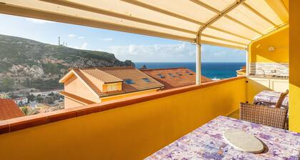 Casa Vacacional 'Sole E Mare Buggerru - Appartamento' con Vista al Mar, Terraza Privada y Aire Acondicionado