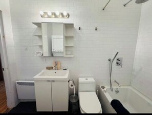 Hair dryer, towels, soap, toilet paper