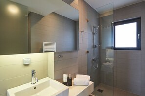 Shower, eco-friendly toiletries, hair dryer, towels