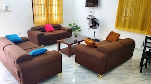 Deluxe Apartment, Balcony, Garden View | Living area - Edelweiss  (Porto-Novo)