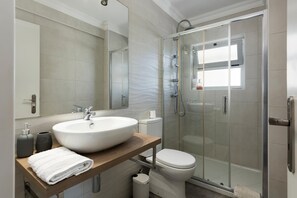 Shower, hair dryer, shampoo