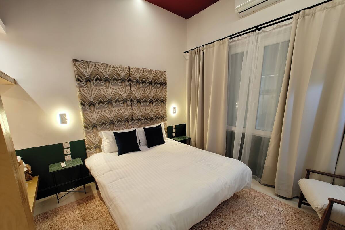 Basic Double Room, City View | Soundproofing, iron/ironing board, free WiFi, bed sheets