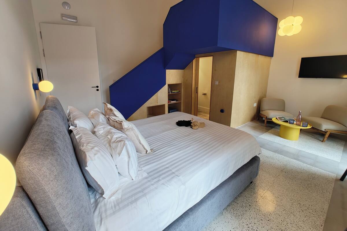 Family Room, Multiple Beds, Terrace, City View | Soundproofing, iron/ironing board, free WiFi, bed sheets
