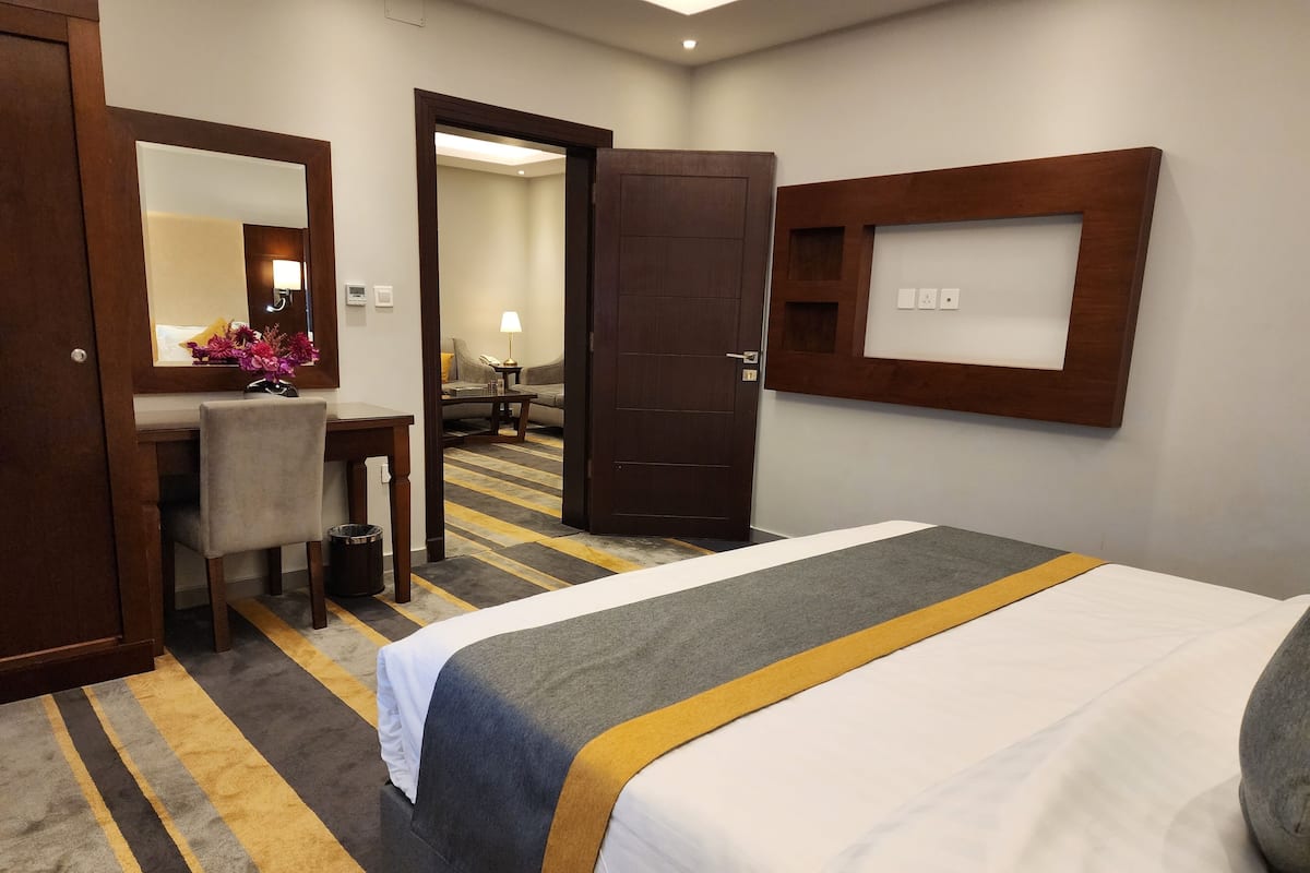 one bed room suite | Premium bedding, memory foam beds, in-room safe, blackout drapes