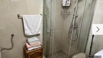 Hair dryer, towels, soap, toilet paper