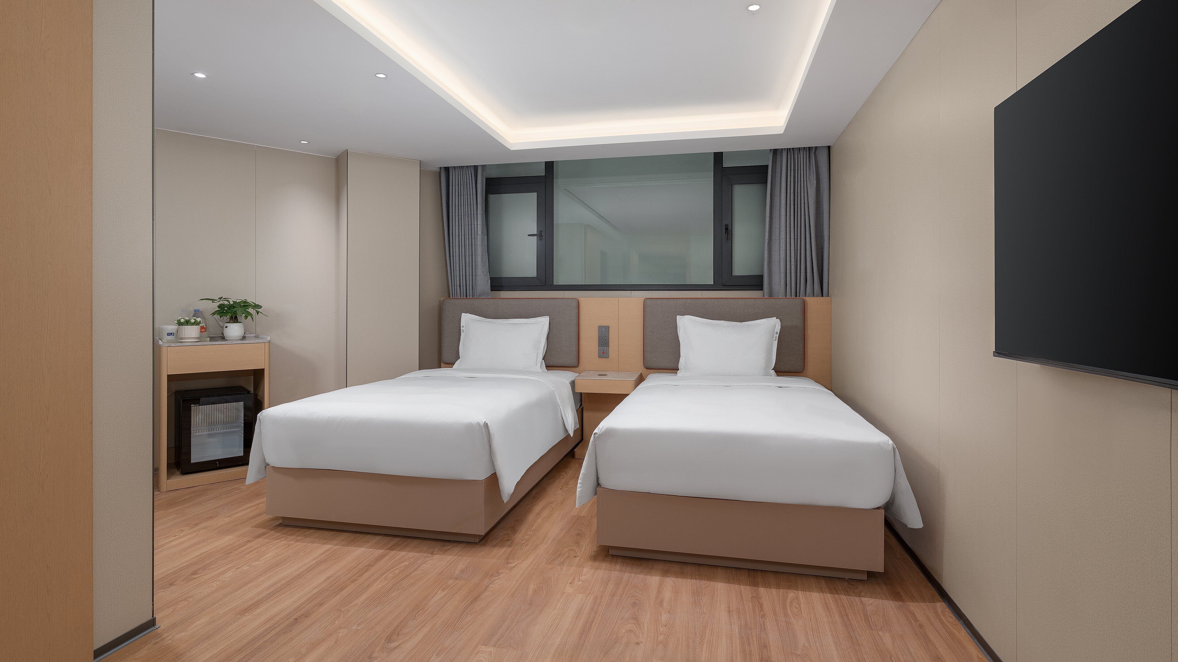 Chambre Standard, 2 lits une place | Literie de qualité supérieure, couette en duvet d'oie, minibar, bureau