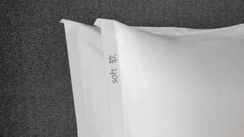 Premium bedding, down comforters, minibar, desk