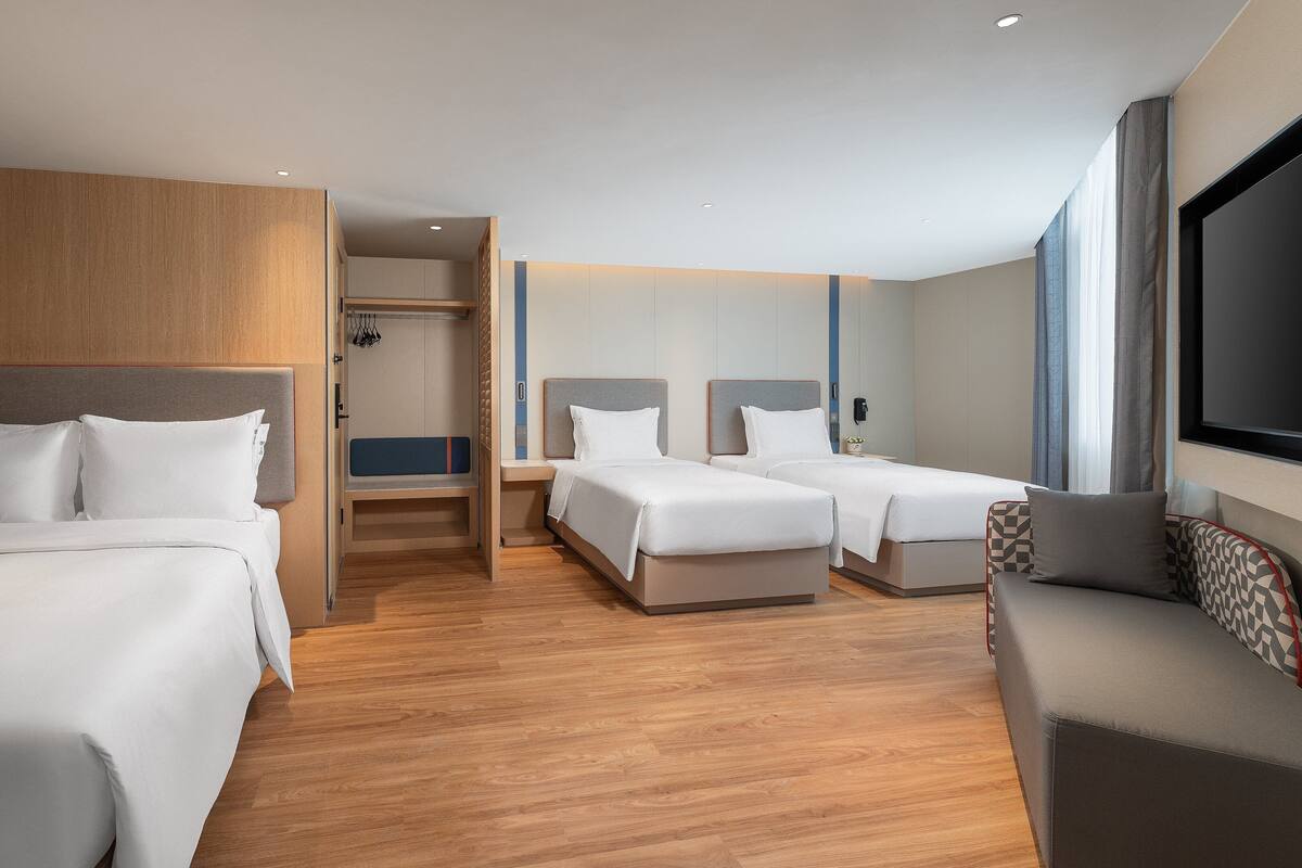 1 Queen And 2 Single Standard | Premium bedding, down comforters, minibar, desk