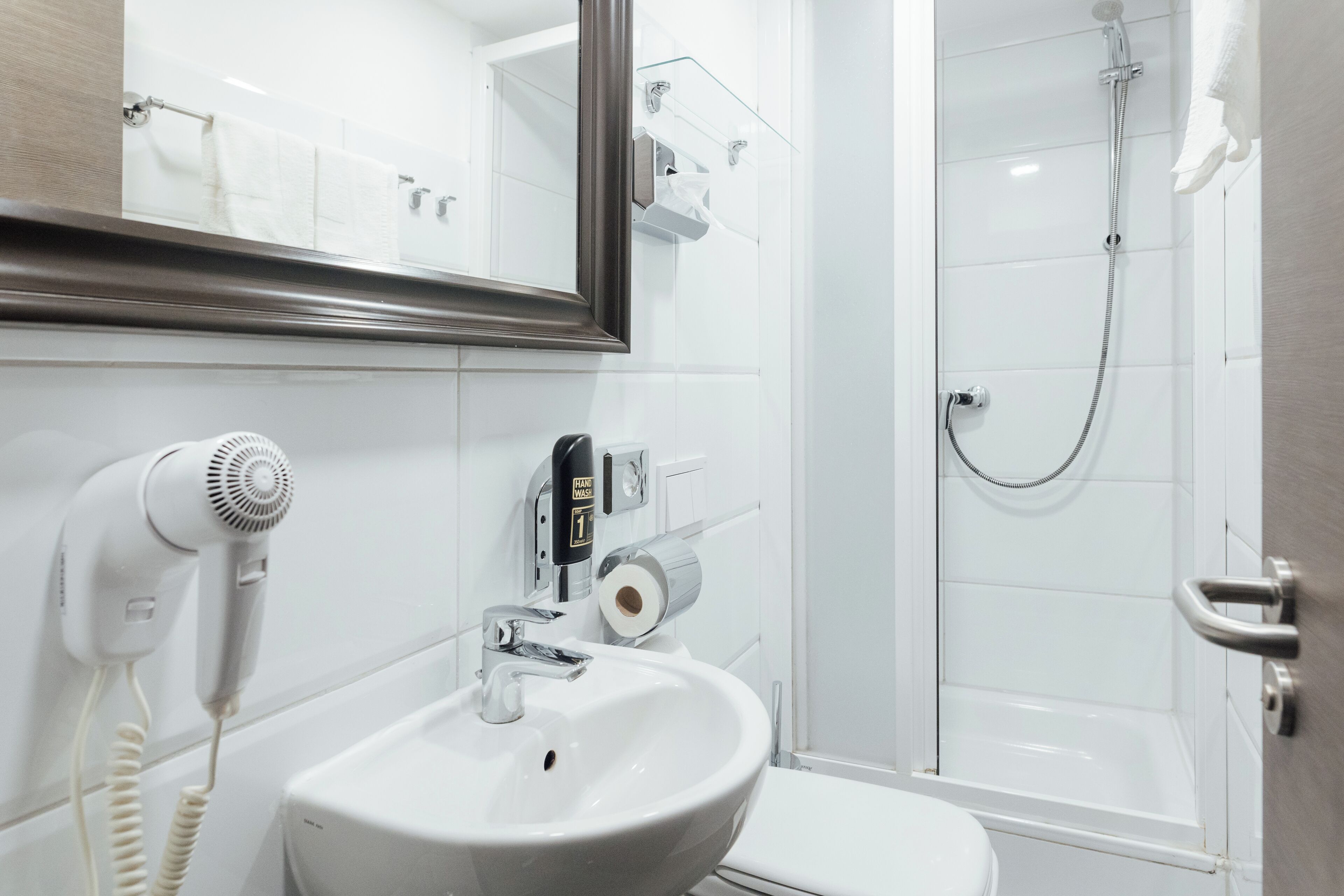 Shower, free toiletries, hair dryer, towels