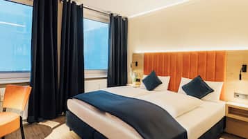 Desk, laptop workspace, blackout drapes, soundproofing