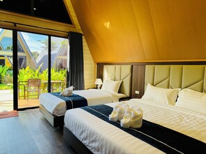 Habitación triple Deluxe, vista al jardín (River or Garden View) | Caja de seguridad en la habitación y wifi gratis