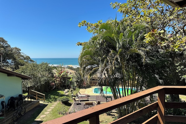 Apartamento família, vista para o mar | Área de estar