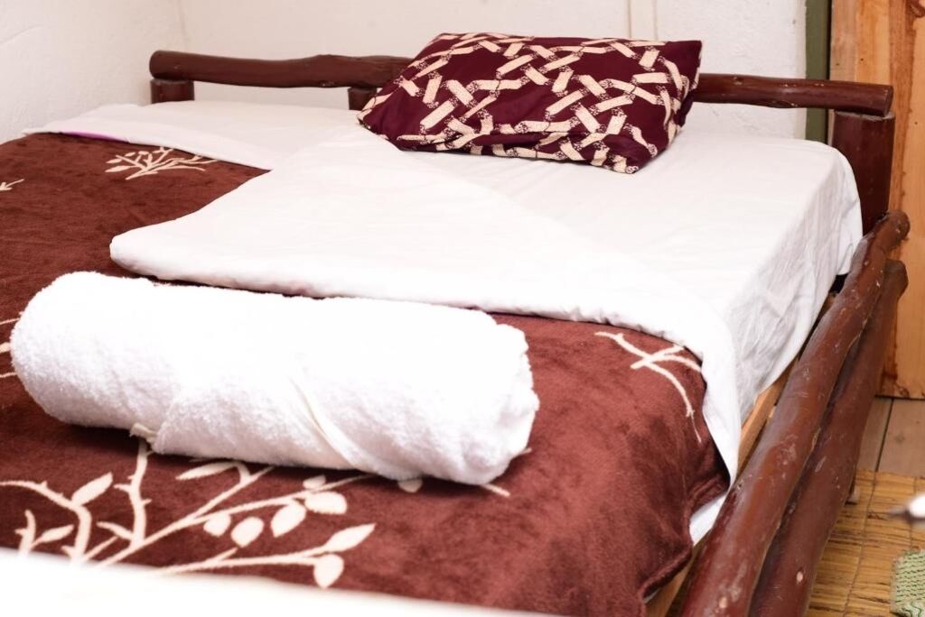 1 chambre, fer et planche à repasser, draps fournis