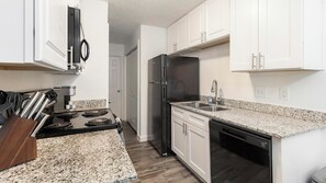 Private kitchen - Landing | Chic 2BD, Pool, Tennis Court (DeSoto)